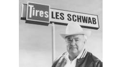 Schwab-photo-with-sign-BW