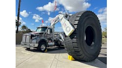 OTR Tire Conference attendees were greeted by a Stellar Industries-built boom truck owned by Purcell Tire & Rubber Co. holding a new 63-inch tire made by Goodyear Tire & Rubber Co.