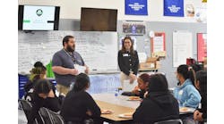 Julie Holmes, co-CEO of Virginia Tire & Auto, was invited by Eric Goldwin of Manassa City Schools to talk to female high-school students about the automotive industry at Osbourn High School in Manassas, Va.