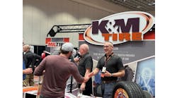 K&M Tire associates greet attendees at the company's annual Dealer Conference and Trade Show in Las Vegas, Nev.