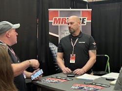 K&M Tire Inc.’s Mr. Tire/Big 3 Tire is one of many groups that has expanded its offerings for dealer members. Here, a Mr. Tire/Big 3 Tire representative talks with dealers during K&M Tire’s 2024 Dealer Conference and Trade Show.