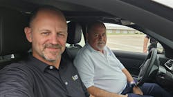 'We believe in relationships and having a high level of transparency and honesty,' says Tom Brackin, CEO of American Omni Trading Co. (AOT), pictured in the driver's seat next to AOT President Chris Brackin.
