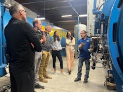 Kenny McMullen, right, manages the retread plant, and says the 17 workers have 200 years of combined retread experience. “It takes a special breed to be a retreader.”