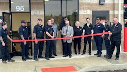 John Marshall, Grismer Tire Co.’s executive vice president (retail), cuts the ribbon at the dealership’s newest store.