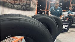 Turbo Wholesale Tires LLC displayed several of its new Rolling Big Power TBR tires during a recent open house event at the company’s Hammond, Ind., distribution center. (Pictured behind tire, JD Casas, Turbo's national sales manager, commercial.)